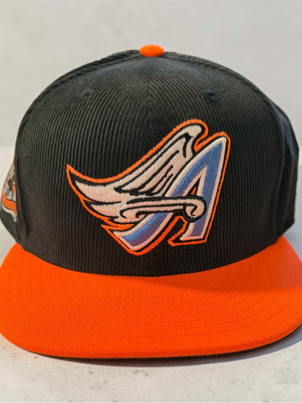New Era Anaheim Angels Corduroy Fitted side patch hat black orange blue